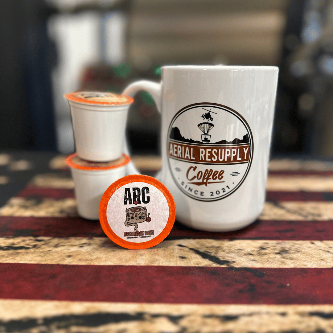 Breakfast Kitty Medium Roast Flavored Coffee Single Serving Pod Kcup with a coffee mug on a table