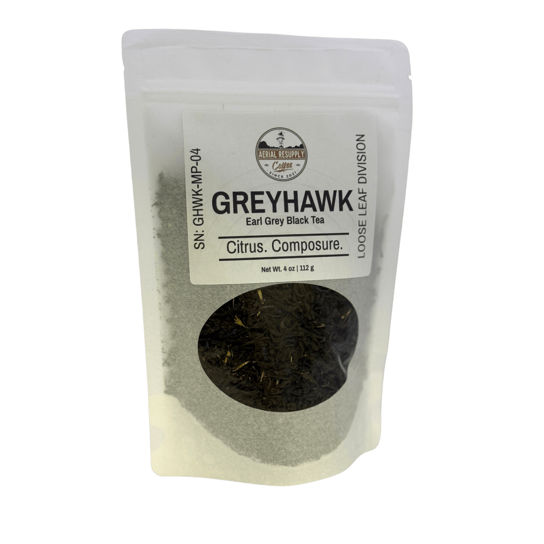 Tea package labeled 'Greyhawk' with visible tea leaves on a white background