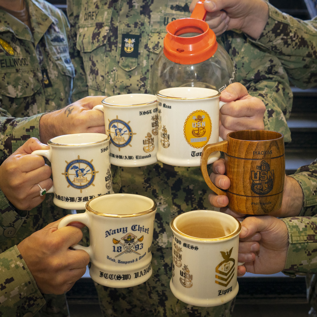 United States Navy Coffee Mugs in a circle with uniforms holding aerial resupply coffee