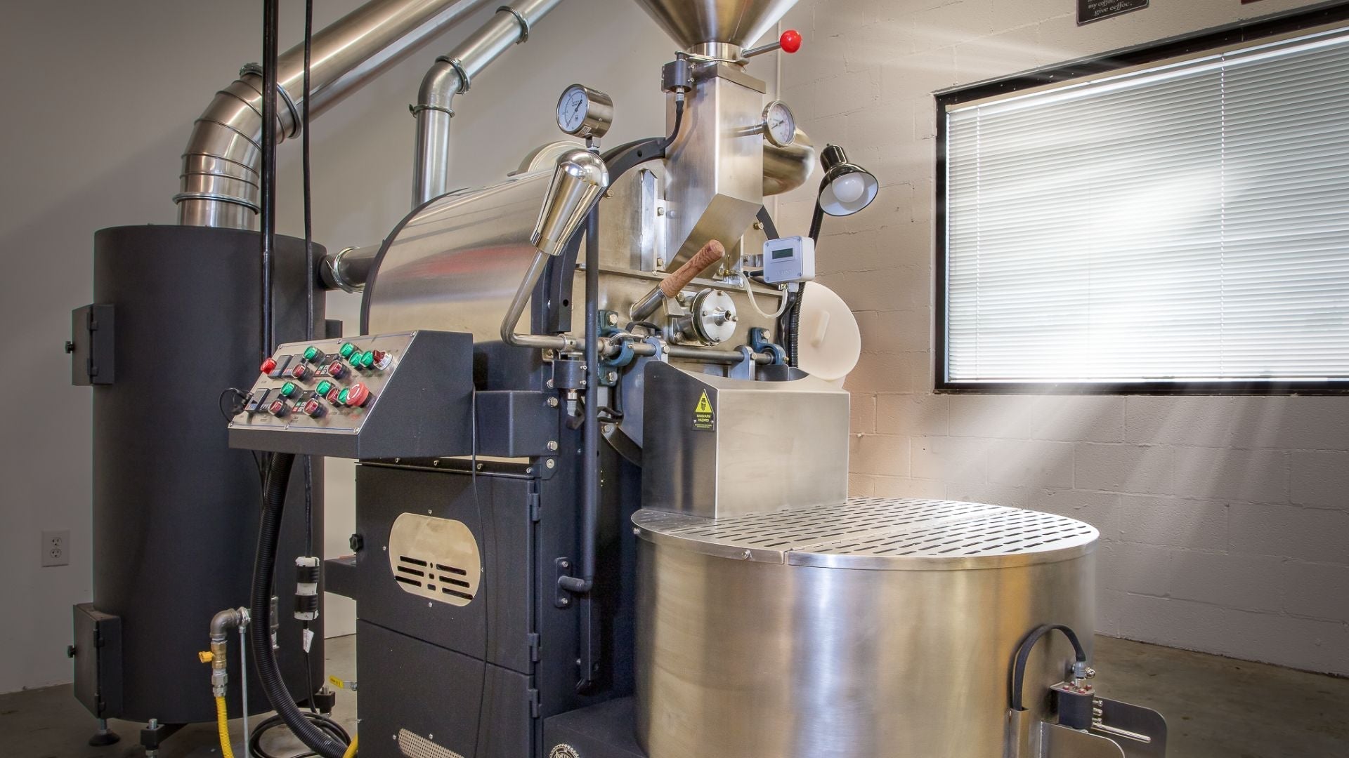 Coffee Roaster in front of a window