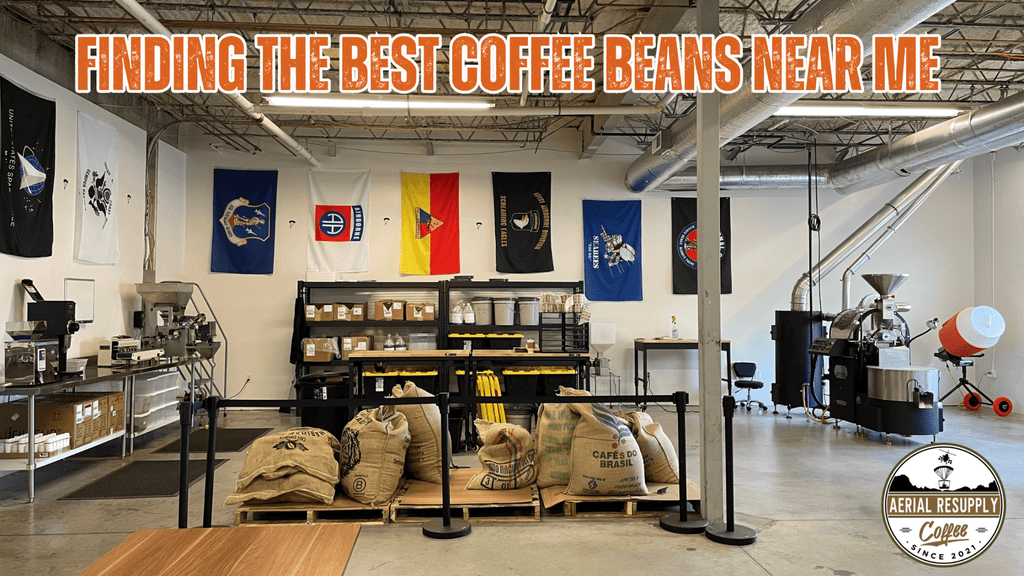 coffee warehouse, coffee bags with flags on the wall and a coffee roaster, aerial resupply coffee