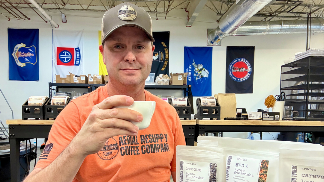 Our founder drinking coffee and tea in our roastery