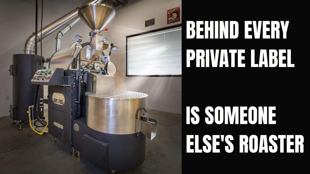 A coffee roaster in a warehouse with white text that says behind every label is someone else's roaster