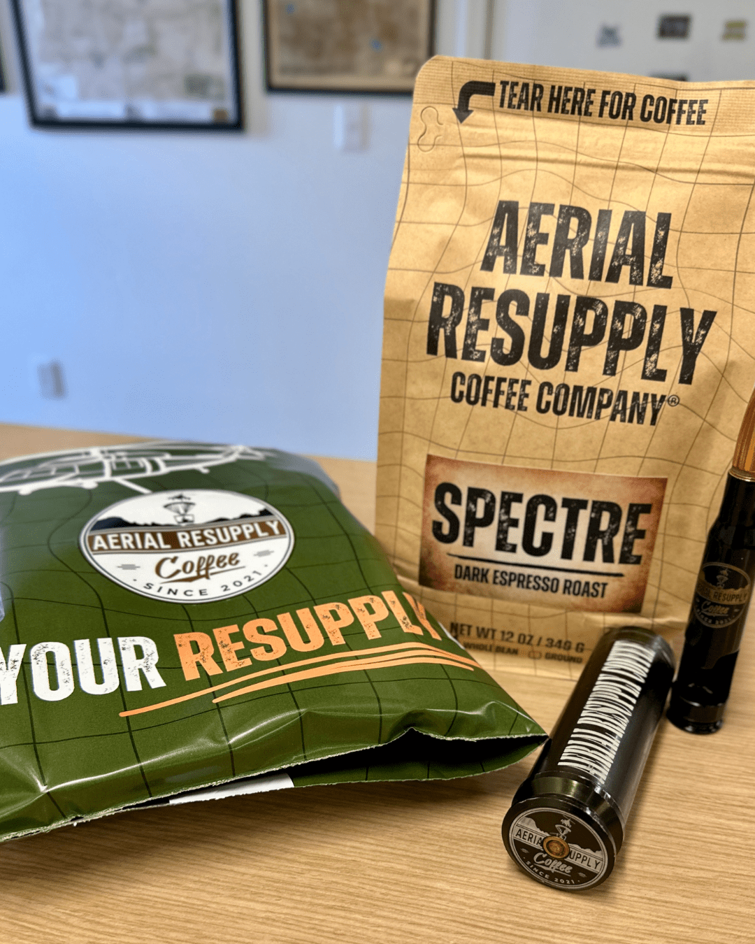 spectre espresso coffee bag with a resupply ready green bag