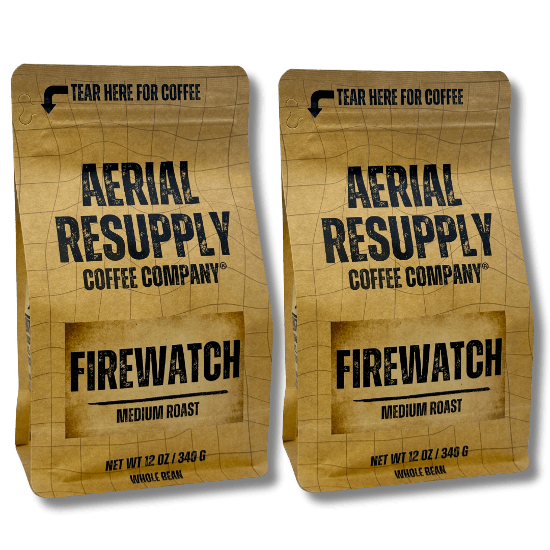 Two packages of Aerial Resupply Coffee Company Firewatch Medium Roast coffee on a white background.