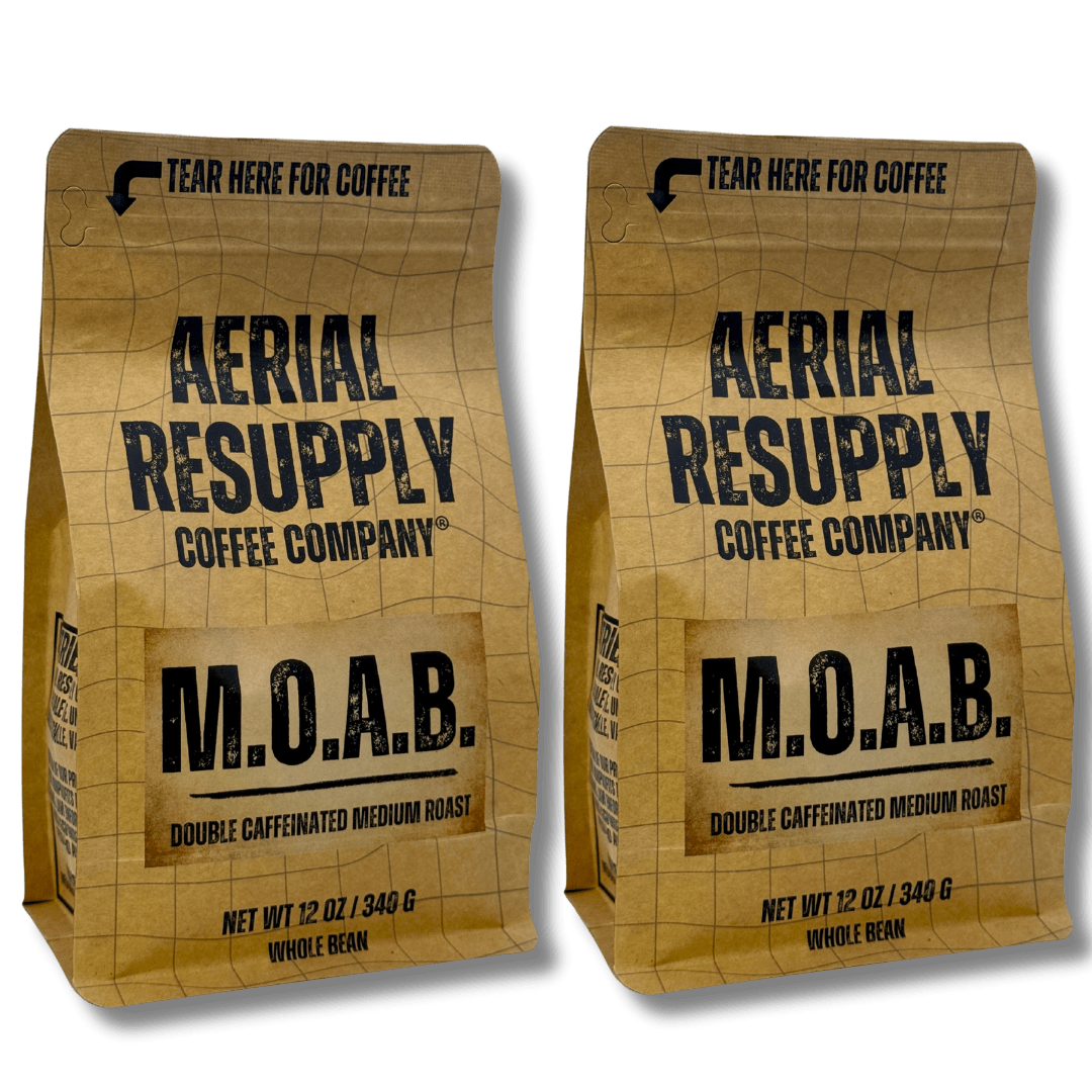 Two packages of Aerial Resupply Coffee Company M.O.A.B. coffee on a white background