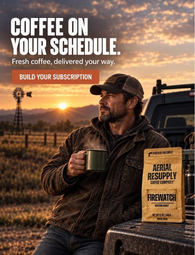 A man in a rustic outdoor setting at sunset holds a mug while a bag of Firewatch coffee sits on a truck bed beside him. Large text reads 'COFFEE ON YOUR SCHEDULE.