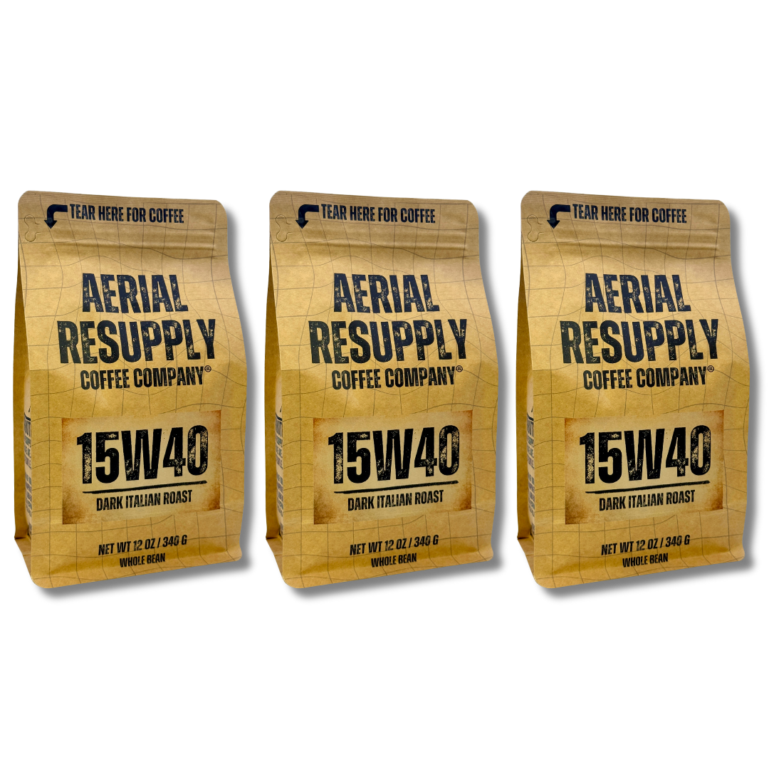 Three bags of Aerial Resupply Coffee Company 15W40 Dark Italian Roast coffee on a white background.