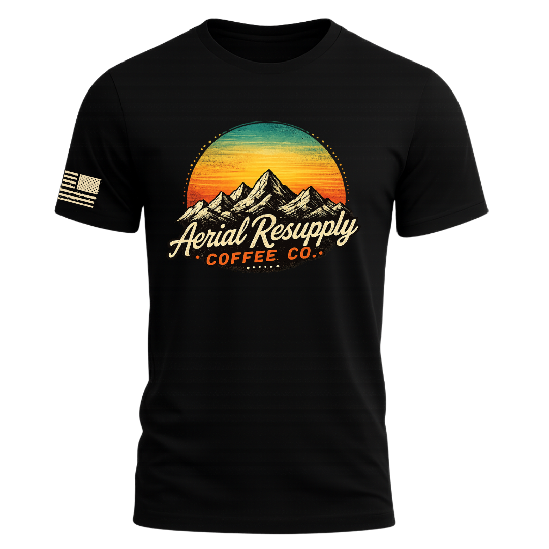 Aerial Resupply retro mountain sunset t-shirt in black, full color badge, flag on sleeve