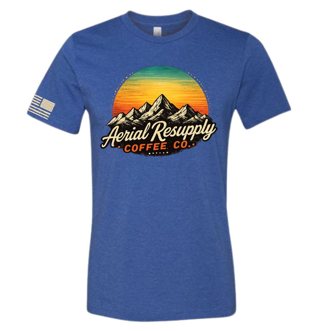 Aerial Resupply retro mountain sunset t-shirt in blue, full color badge, flag on sleeve