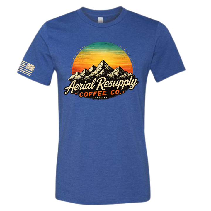 Aerial Resupply retro mountain sunset t-shirt in blue, full color badge, flag on sleeve