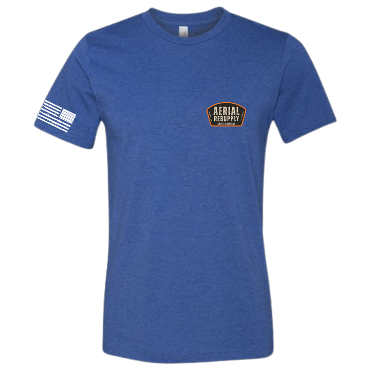 Blue t-shirt with a logo and flag on a white background