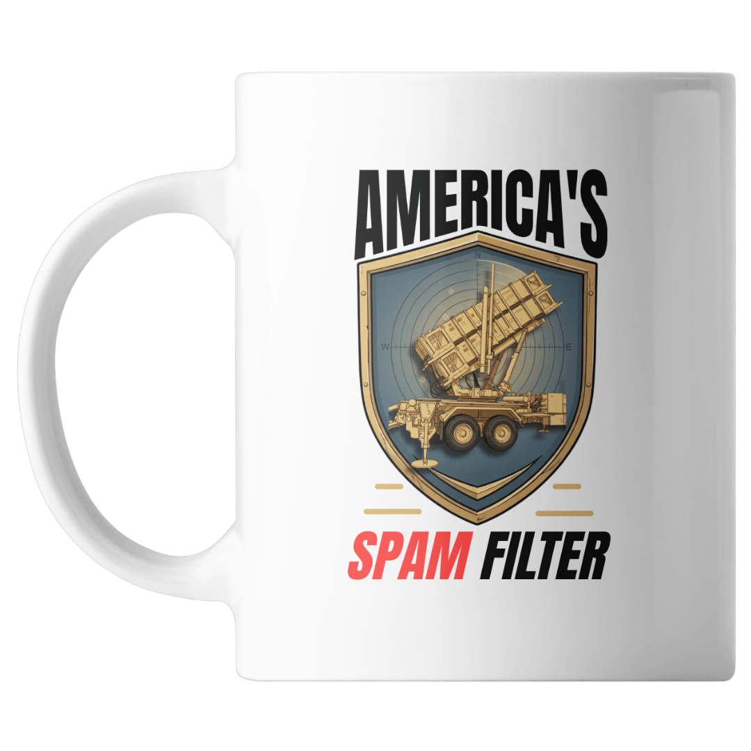 a white mug with text that says America's  Spam Filter and a missile launcher on it