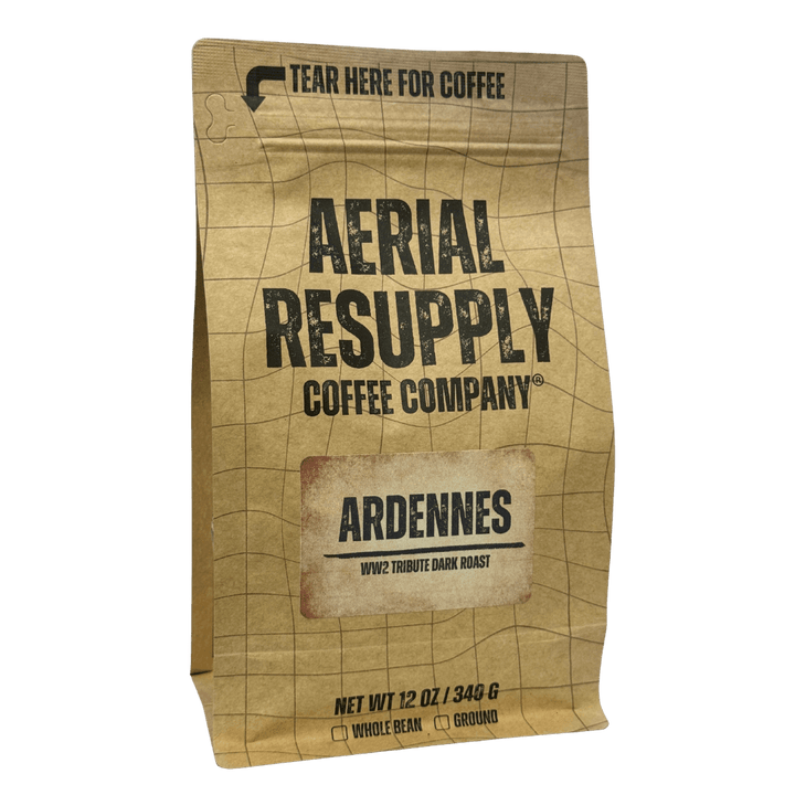A brown bag with aerial resupply coffee and ardennes dark roast on the front