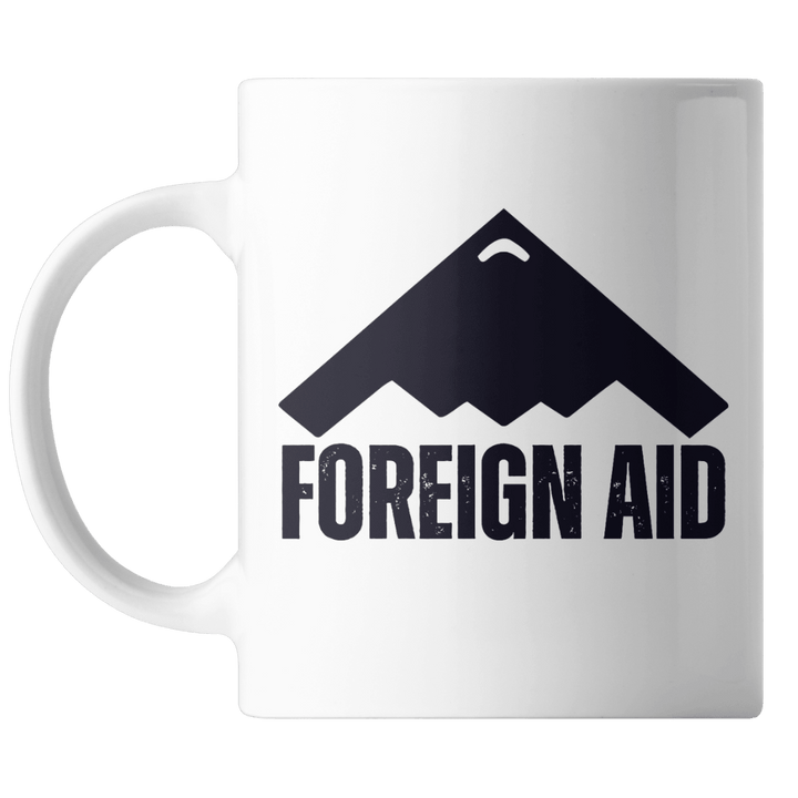 White mug with black 'FOREIGN AID' text and mountain graphic on a white background