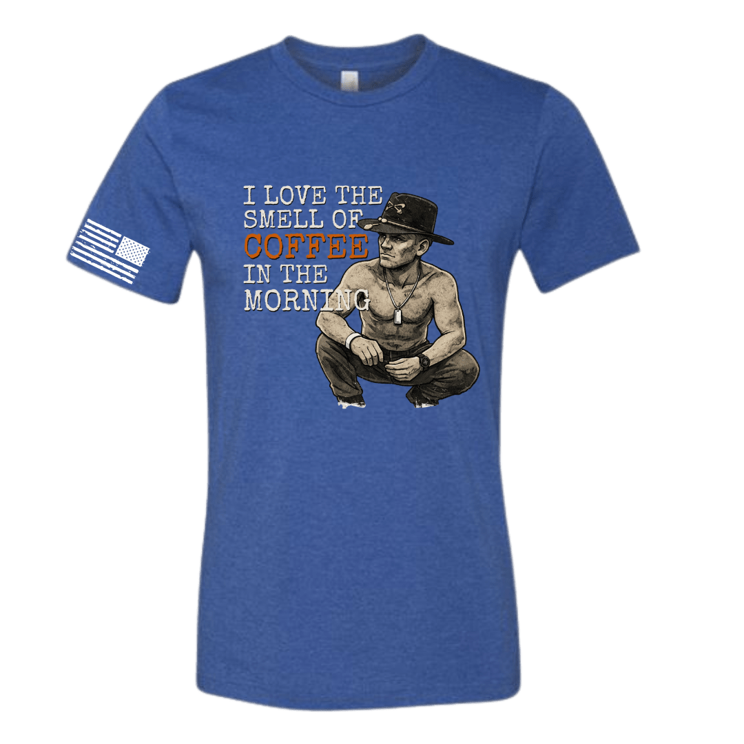 Blue t-shirt with graphic of a man and text 'I love the smell of coffee in the morning' on a white background