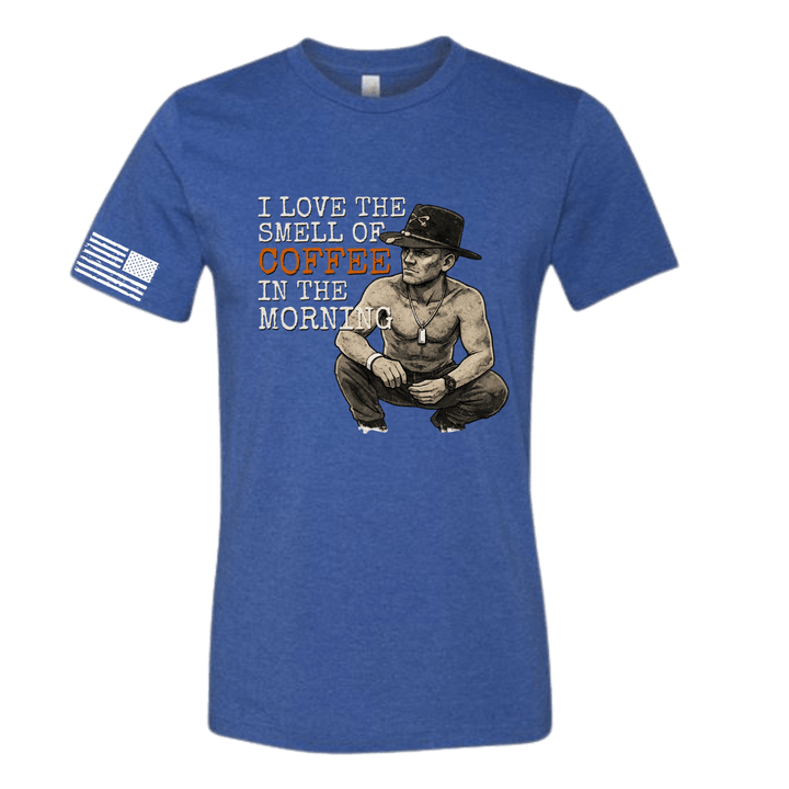 Blue t-shirt with graphic of a man and text 'I love the smell of coffee in the morning' on a white background