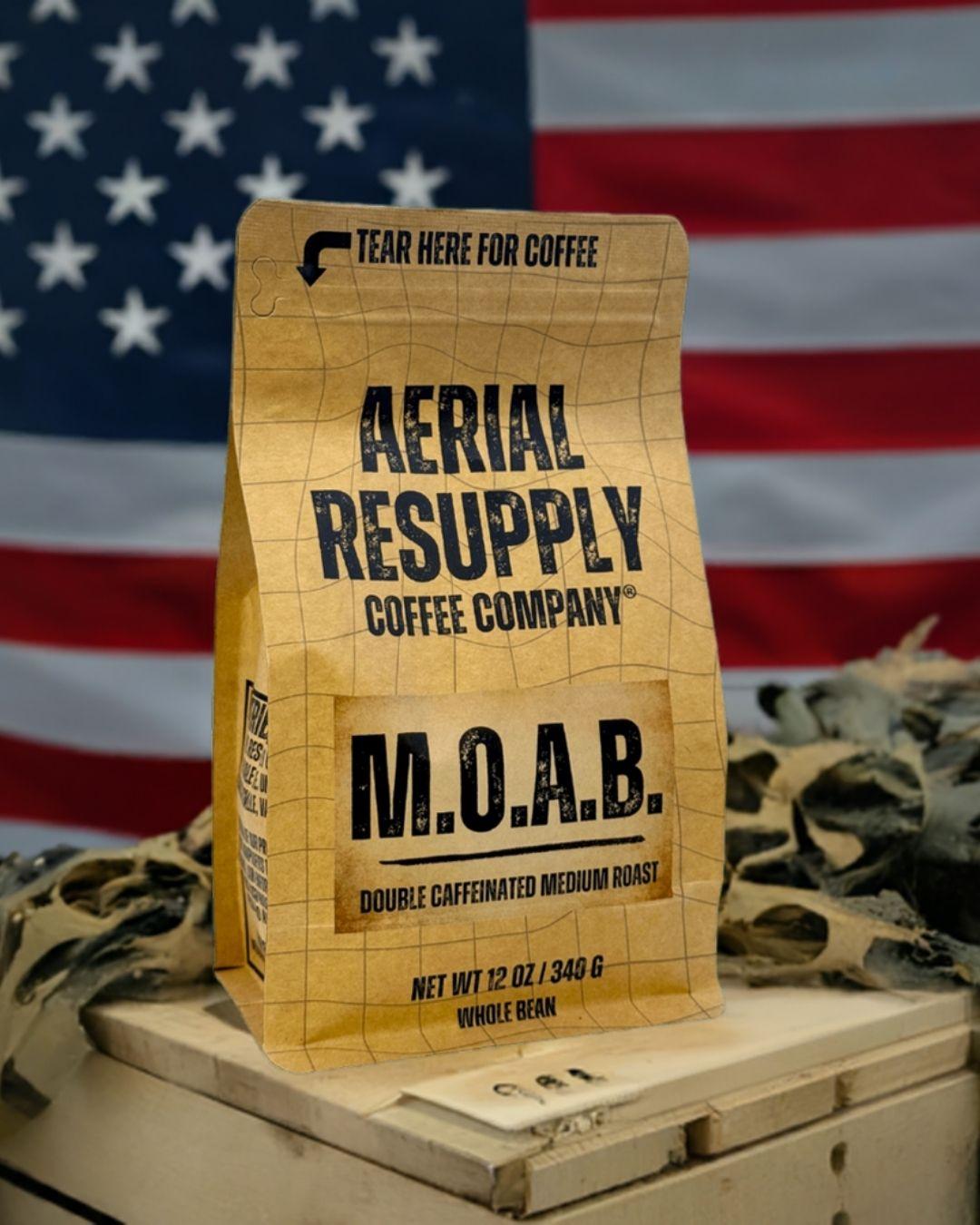 Aerial Resupply Coffee Company M.O.A.B. coffee bag with American flag in the background
