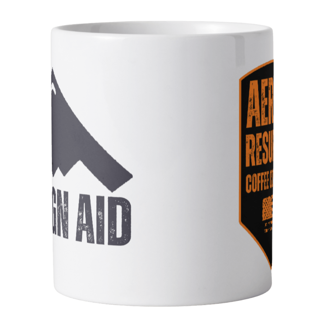 White mug with mountain and text design on a white background