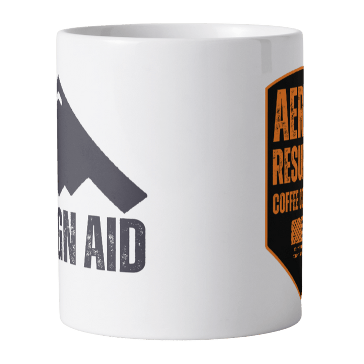 White mug with mountain and text design on a white background