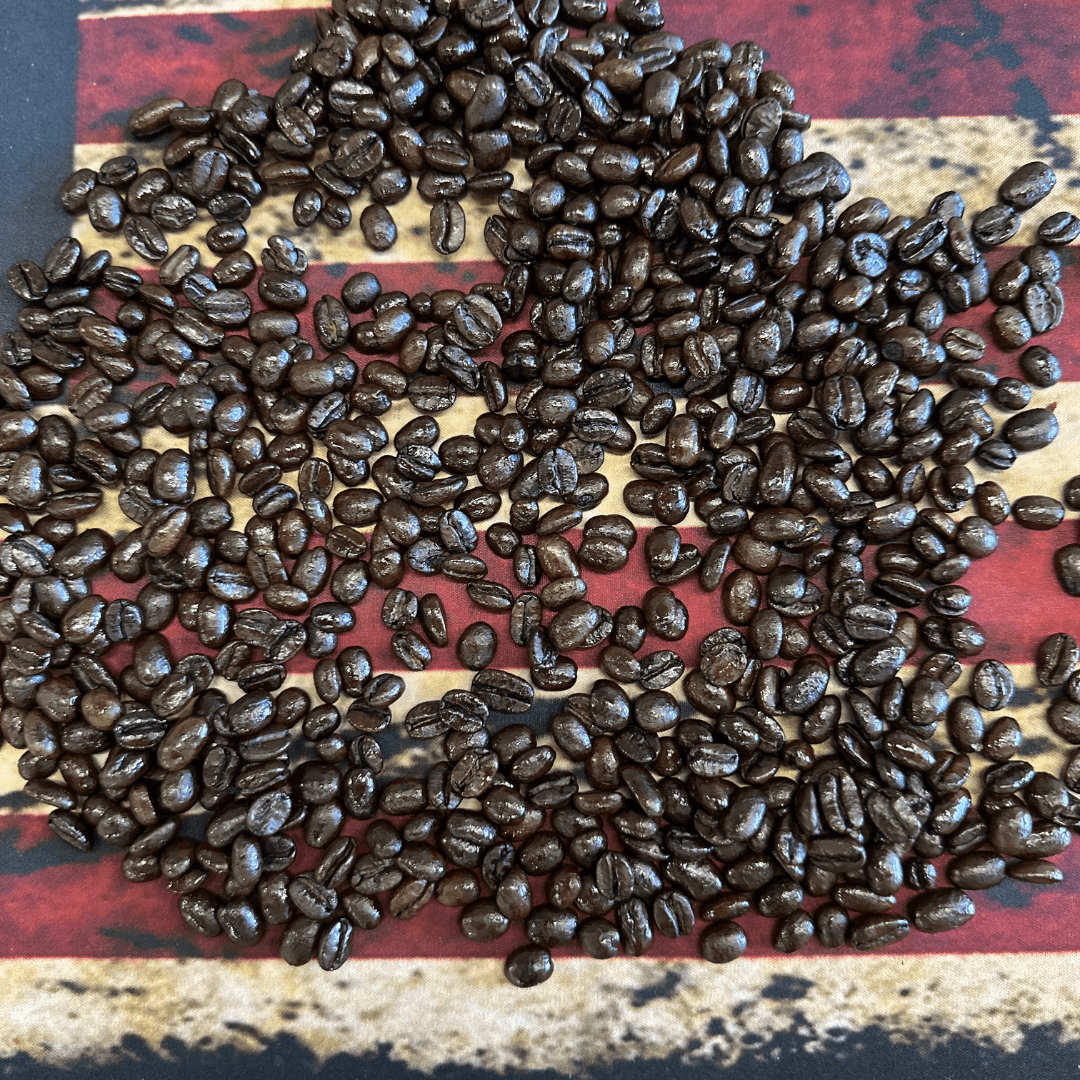 Spectre Dark Espresso roast premium whole bean and preground five pound bulk coffee on an American Flag