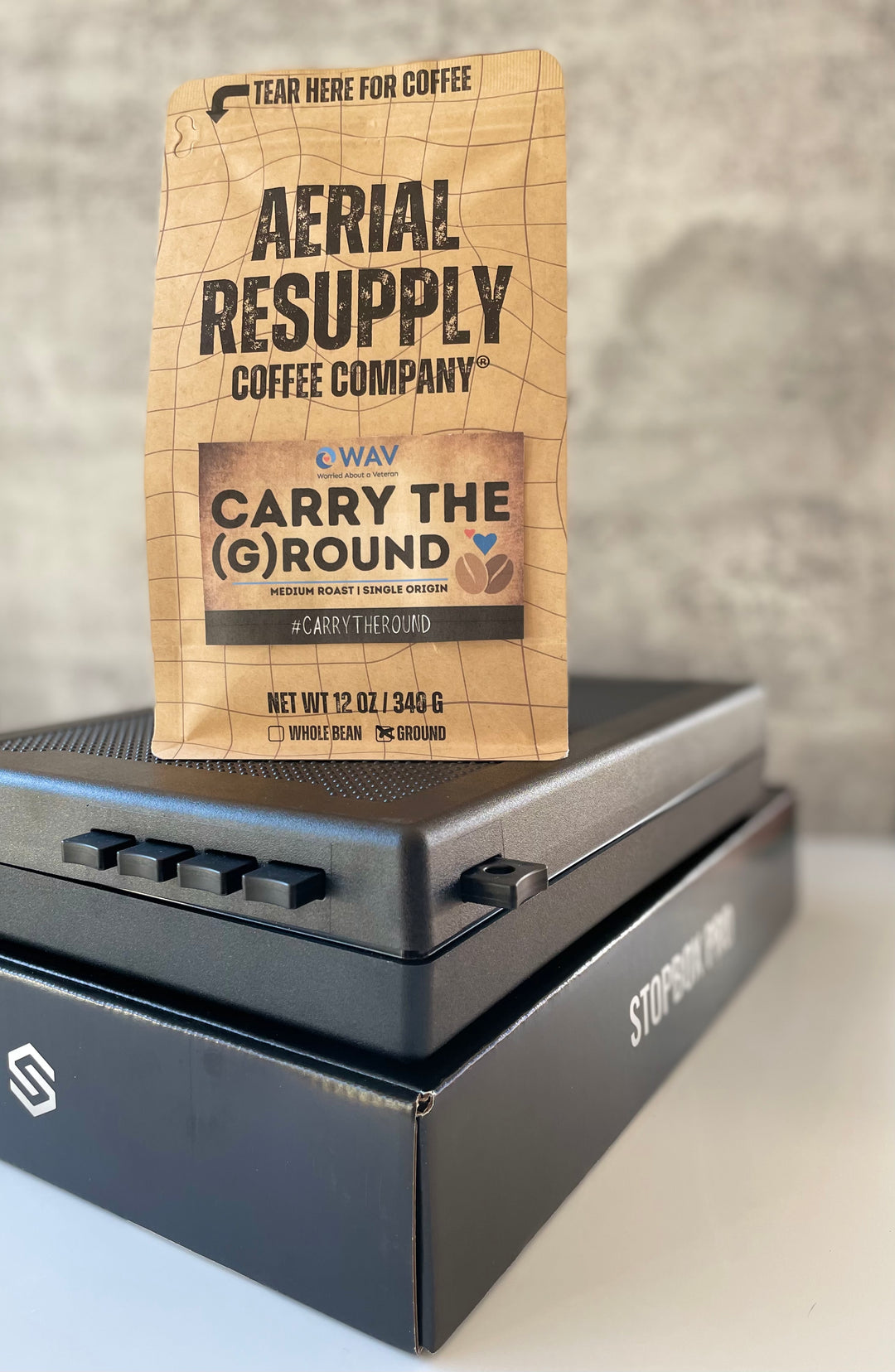 Firewatch "Carry the Ground" Aerial Resupply Coffee with a Stopbox Pro Compact Gun Safe