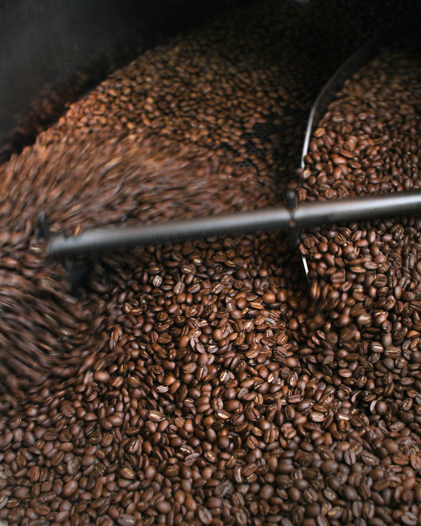 Fresh Coffee being roasted in a coffee roaster