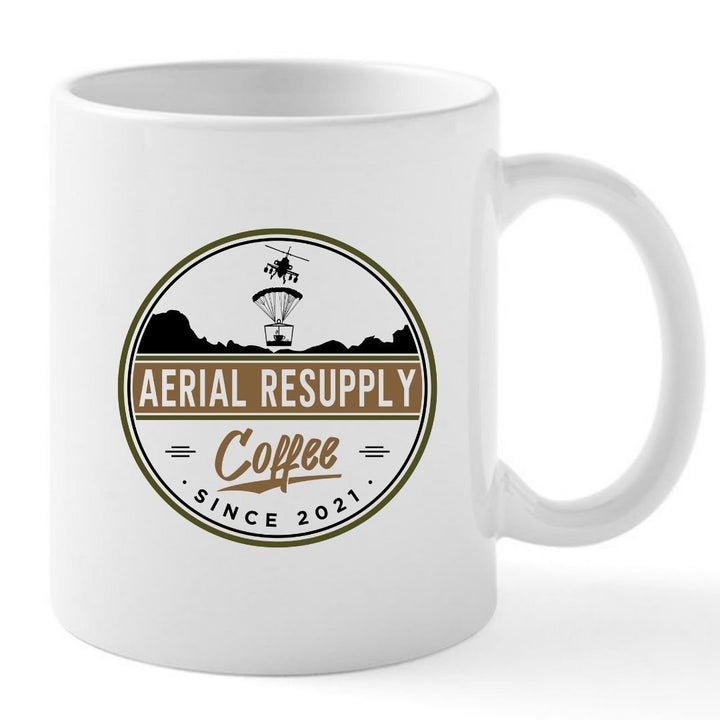 Stay caffeinated ceramic 15 ounce novelty mug from Aerial Resupply Coffee. Comes with slide-lock lid. Logo side.