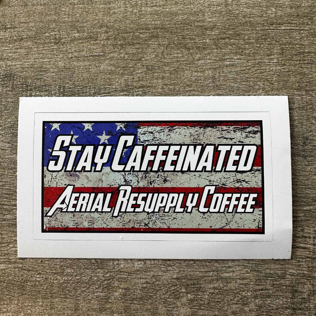 Stay caffeinated 3 inch vinyl sticker on an American Flag backing. Patriotic from a veteran-owned coffee company.